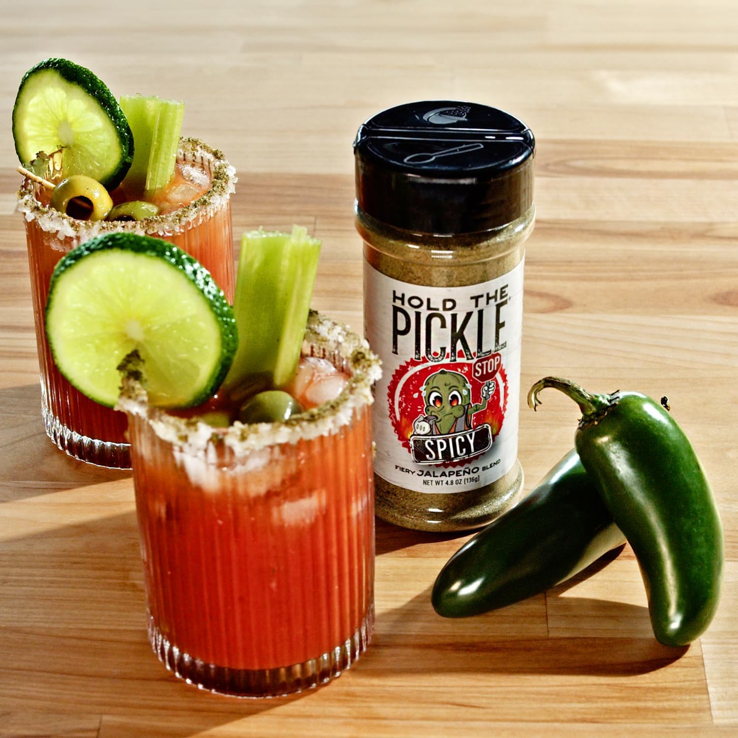 Hold The Pickle shaker held in hand showing size and portability