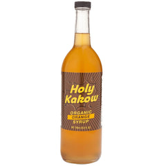 Holy Kakow bottle front label showing organic orange syrup, clear branding and volume