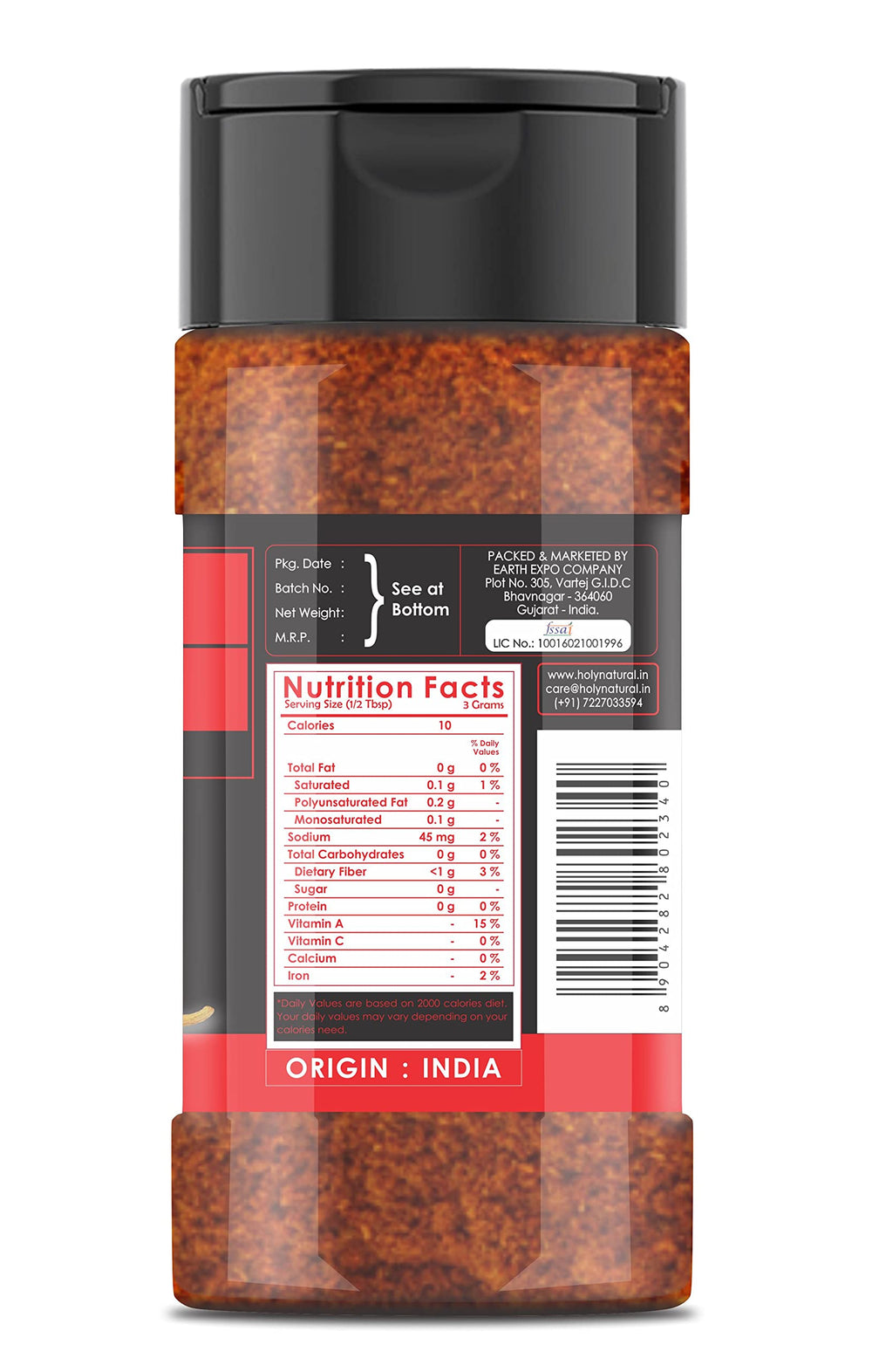 Holy Natural jar open revealing smoked Bhut Jolokia powder for intense seasoning