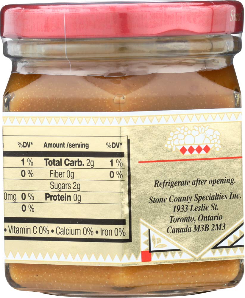 Honeycup close-up texture on a spoon highlighting smooth consistency and spreadability