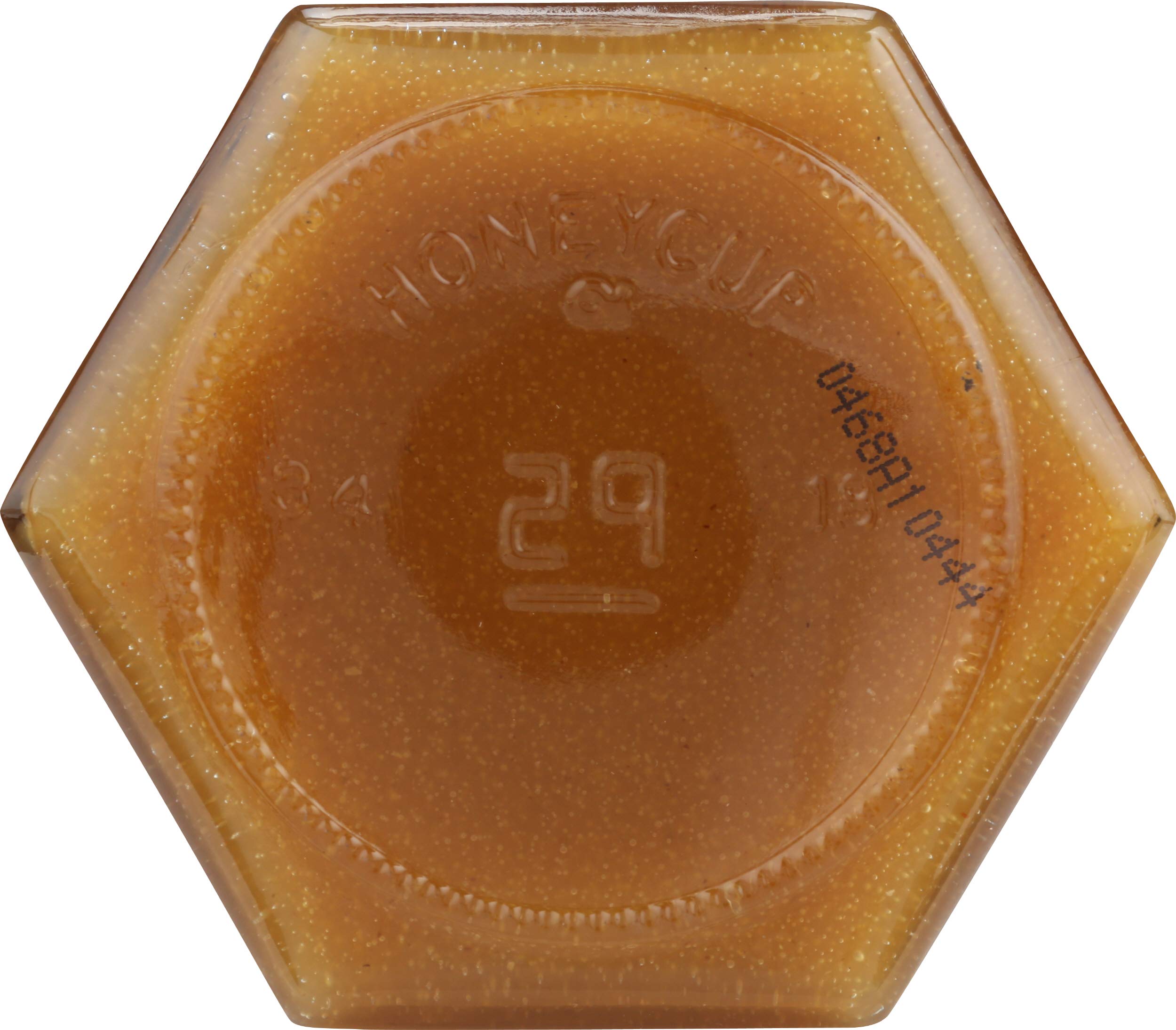 Honeycup jars lined on pantry shelf illustrating storage-friendly compact condiment