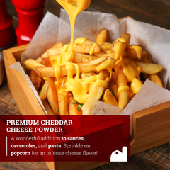 Hoosier Hill Farm powder sprinkled on popcorn, adding bold cheesy snack flavor