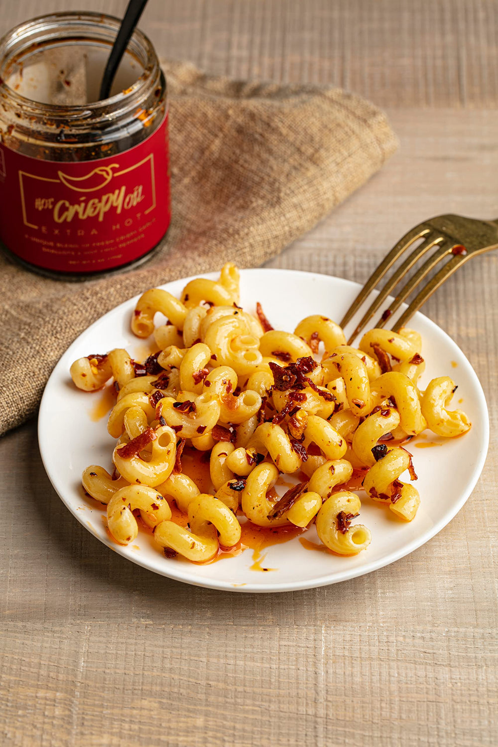 Hot Crispy Oil spooned over noodles delivering heat and umami