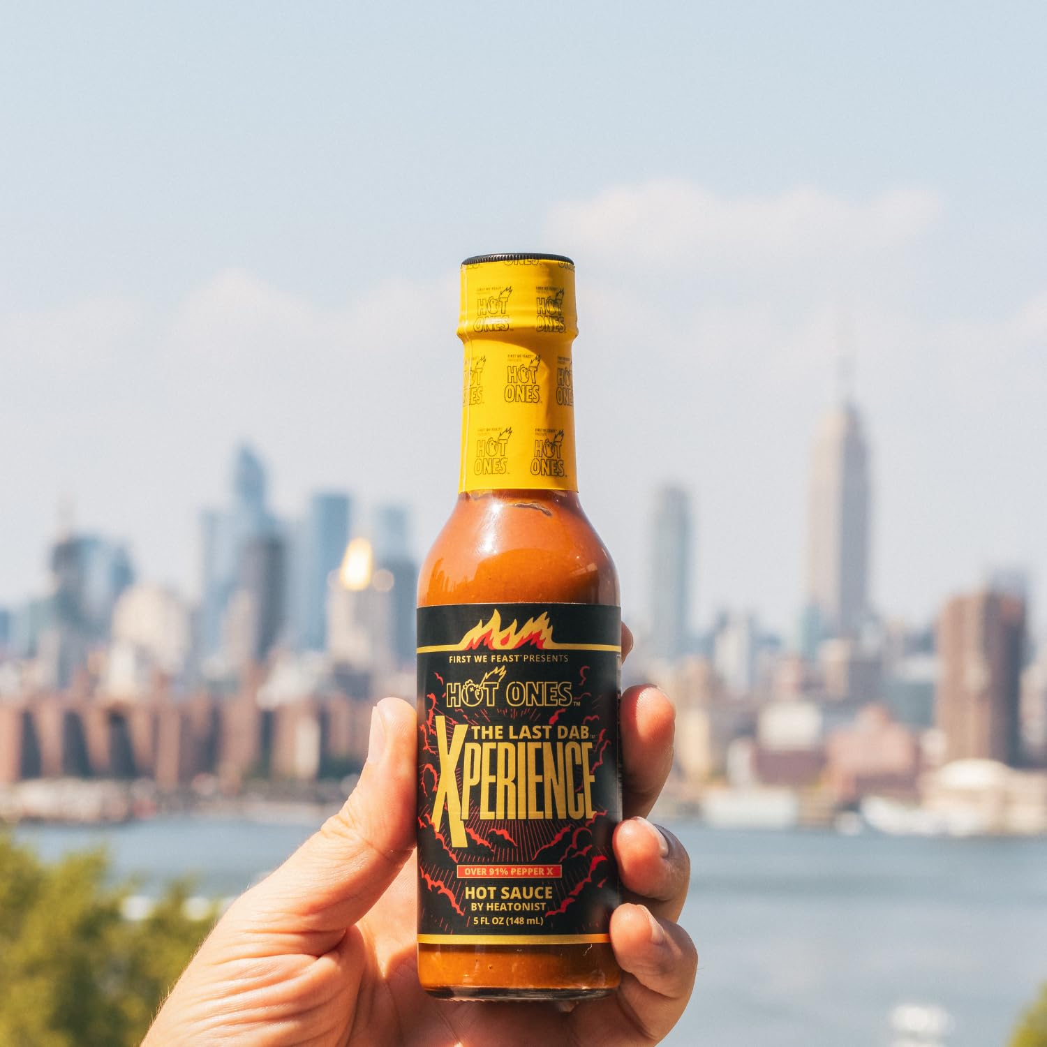 HOT ONES Last Dab drizzled on pizza demonstrating finishing heat and flavor