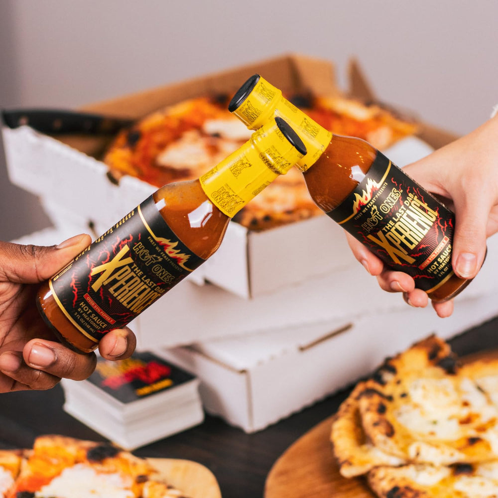HOT ONES Last Dab sauce pouring onto spoon highlighting texture and intensity