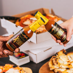 HOT ONES Last Dab sauce pouring onto spoon highlighting texture and intensity