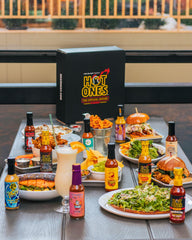 HOT ONES ten bottles lined up for scale and easy comparison of sauces