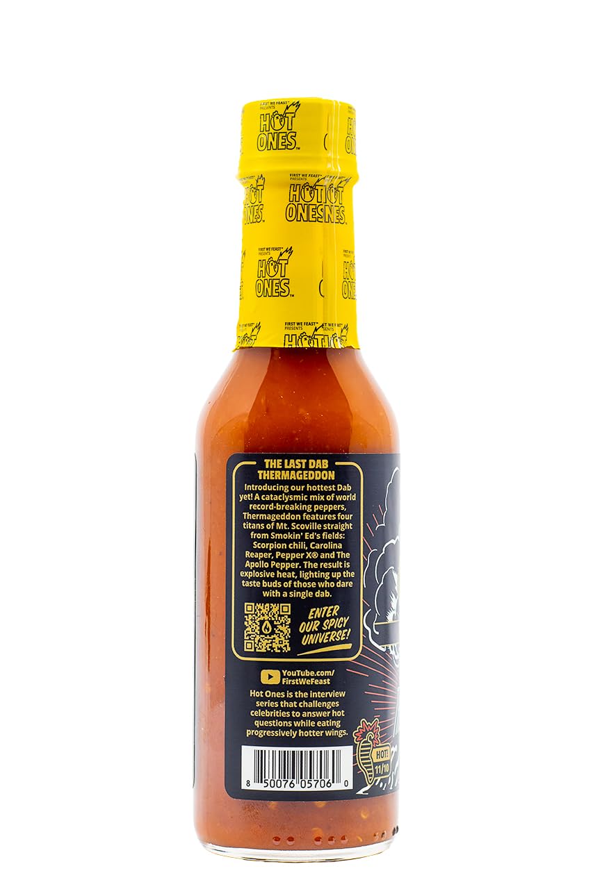 HOT ONES Thermageddon bottle next to spoon for scale and serving suggestion
