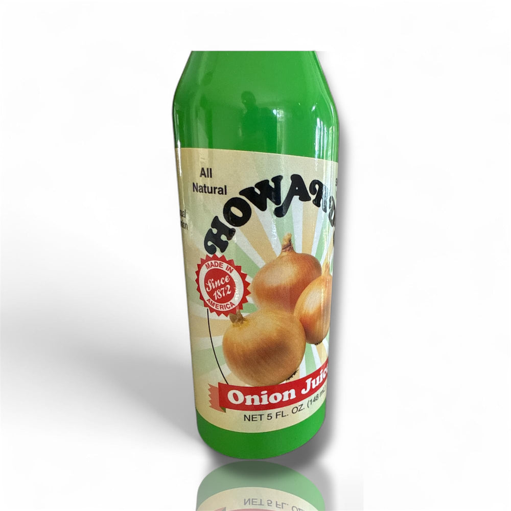 Howard’s bottle being added to a skillet during cooking to boost savory depth