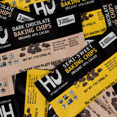 Hu dark chocolate chips close-up texture highlighting smooth cacao-rich surface for meltability