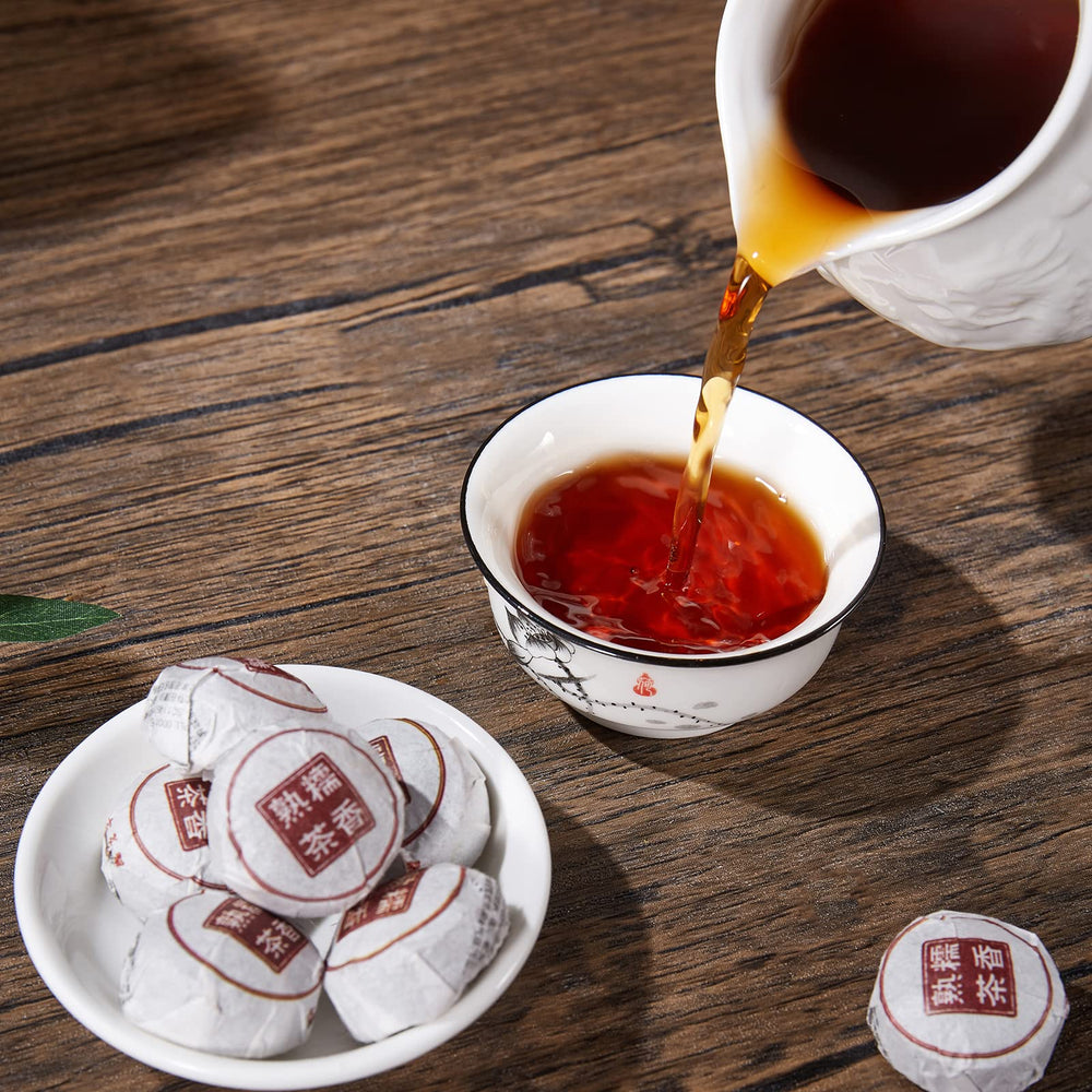 HUAYING brewed tea being poured showing rich color and long-lasting flavor