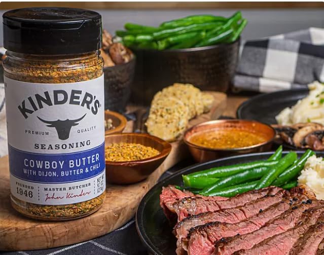 HUBZ Cowboy Butter sprinkled on a biscuit delivering buttery herb enhancement
