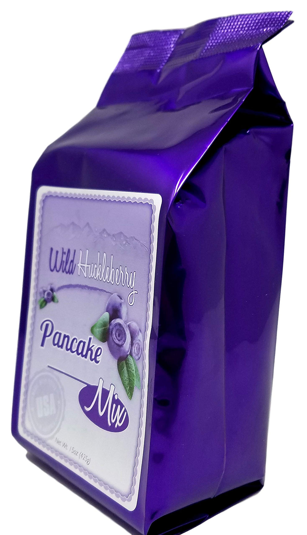 Huckleberry Haven pancake stack with huckleberry flavor visible and fluffy texture