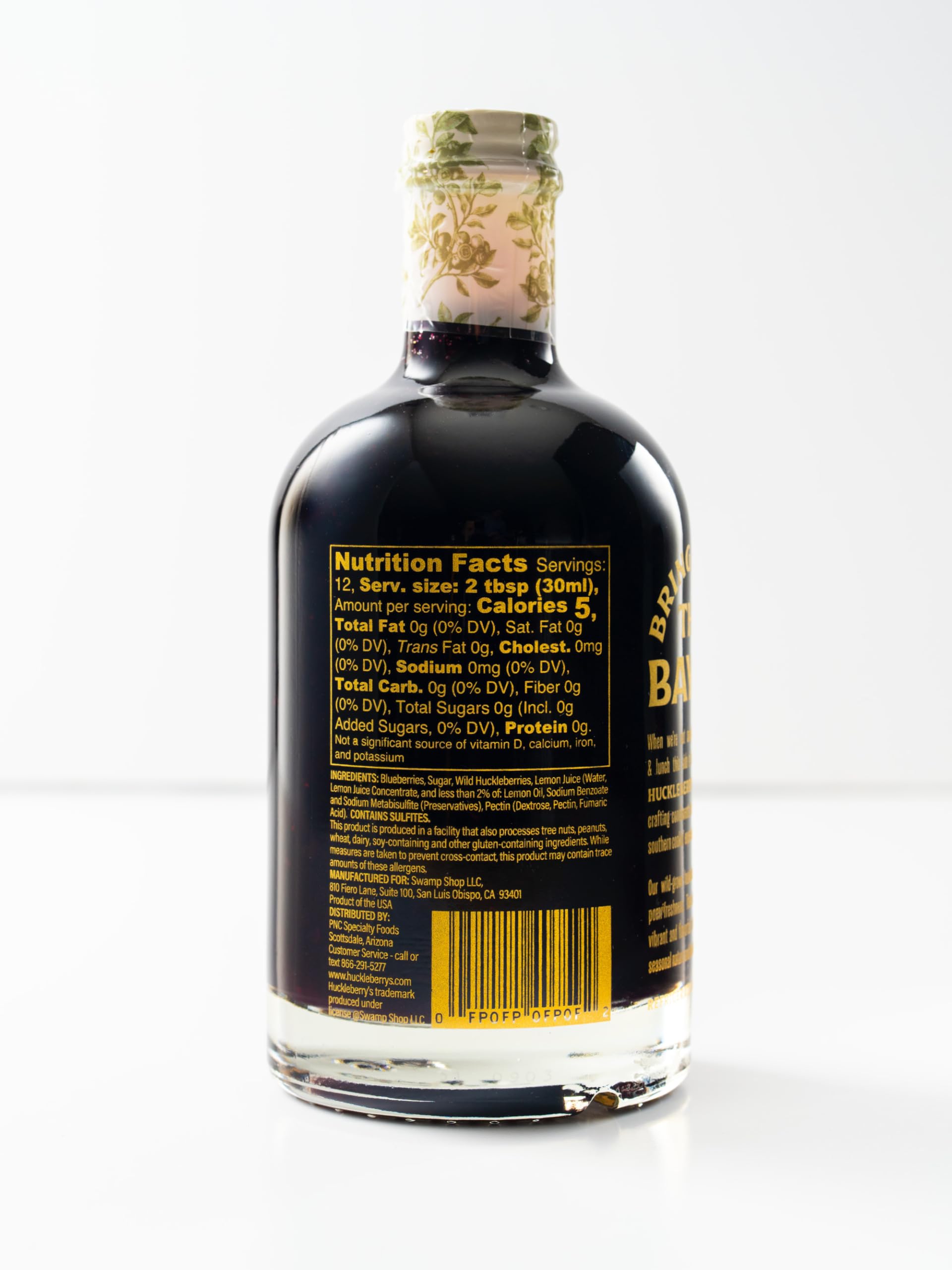 HUCKLEBERRY'S BREAKFAST · LUNCH syrup close-up texture illustrating rich pour