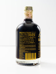 HUCKLEBERRY'S BREAKFAST · LUNCH syrup close-up texture illustrating rich pour
