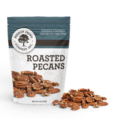 Hudson Pecan Company front packaging showing 8 oz pouch and brand benefit