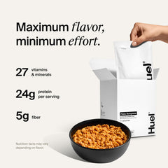 Huel open pouch with visible rehydrated Bolognese texture for quick meals