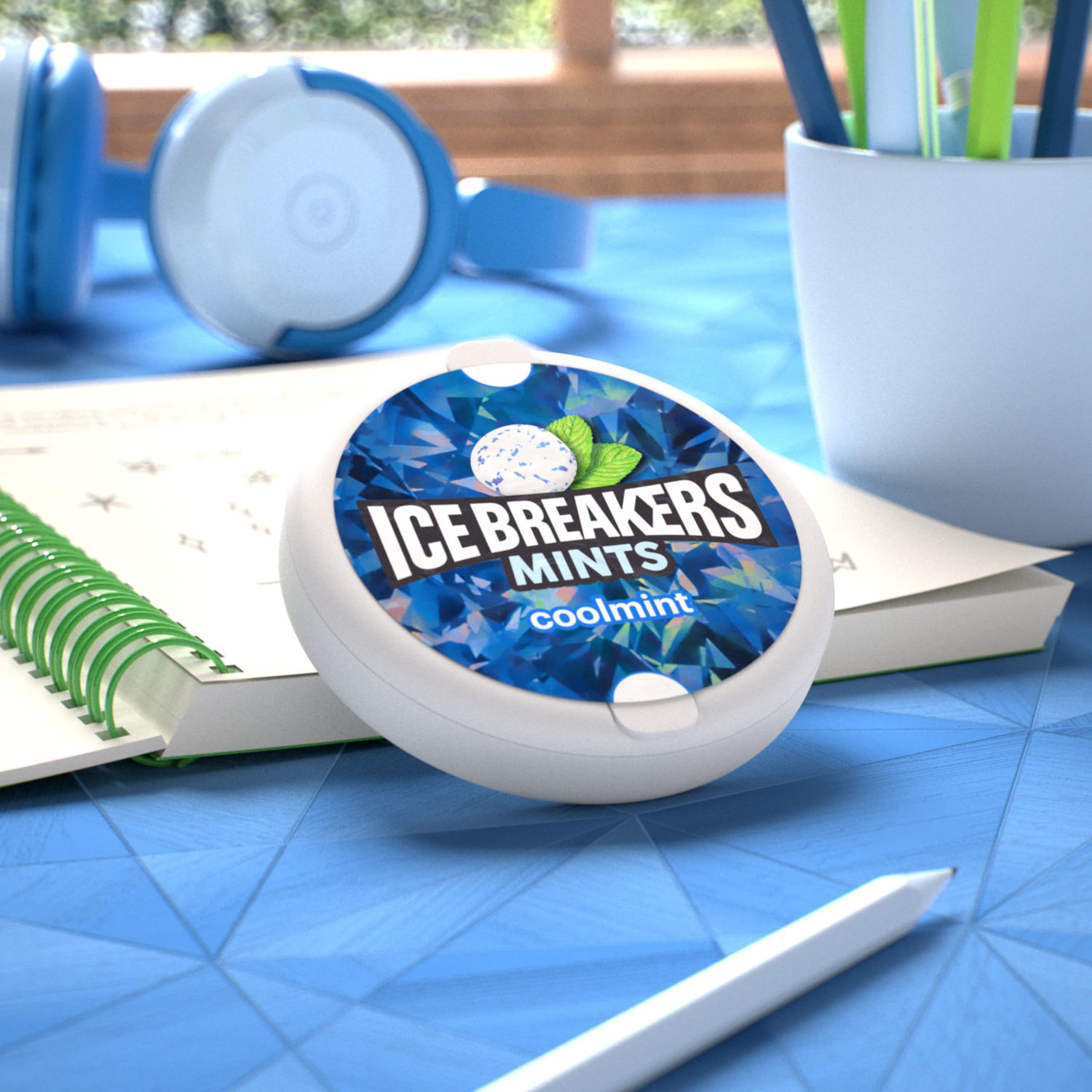 Ice Breakers coolmint tin in car cupholder for instant breath freshening while driving