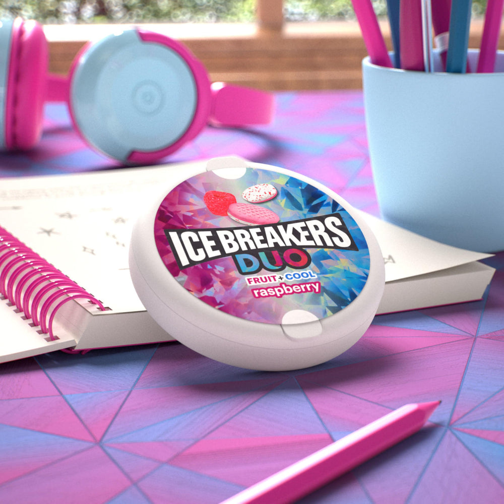 Ice Breakers Duo tin in a pocket demonstrating portability and on-the-go freshness