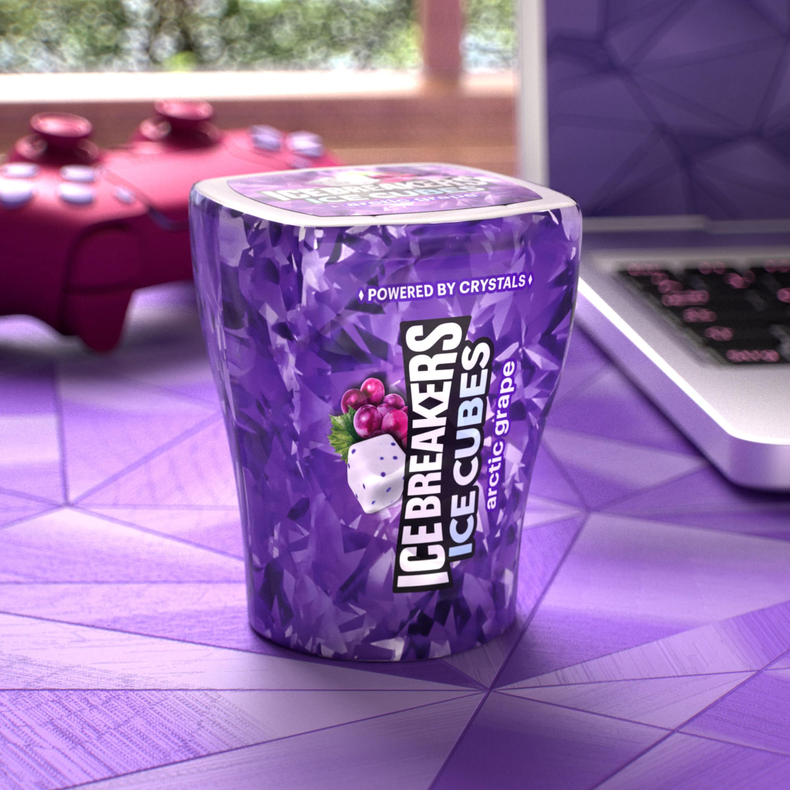 Ice Breakers hand holding bottle showing compact size and portability