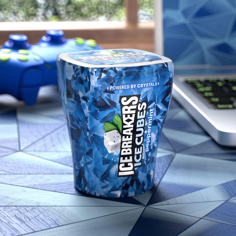 Ice Breakers bottle in car cup holder demonstrating convenient travel-ready freshness