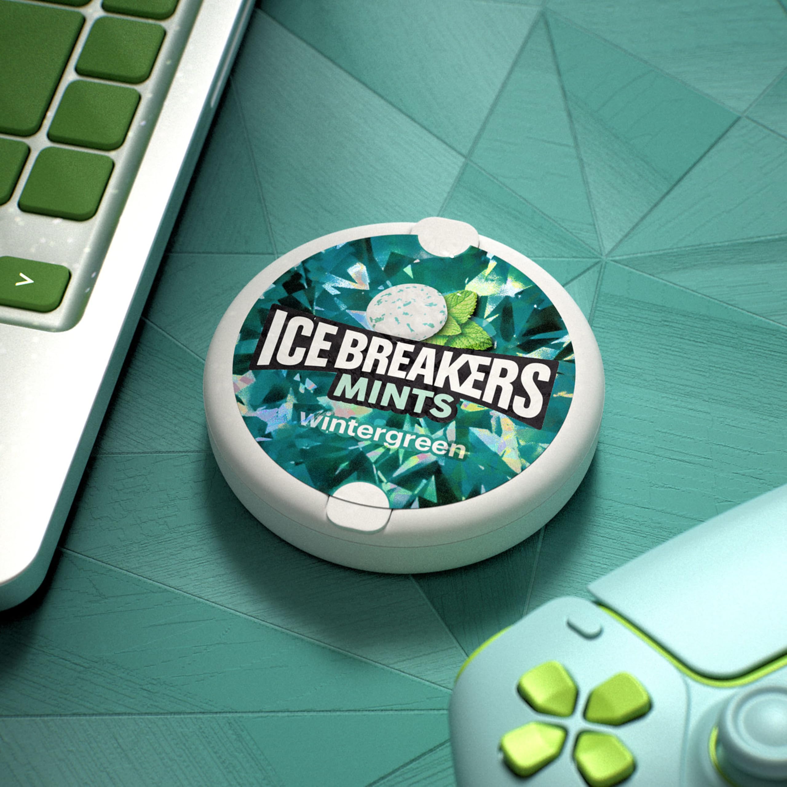 Ice Breakers tin peeking from a pocket highlighting portable freshness convenience