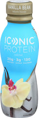 ICONIC bottle beside a phone and wallet to show single-serve scale