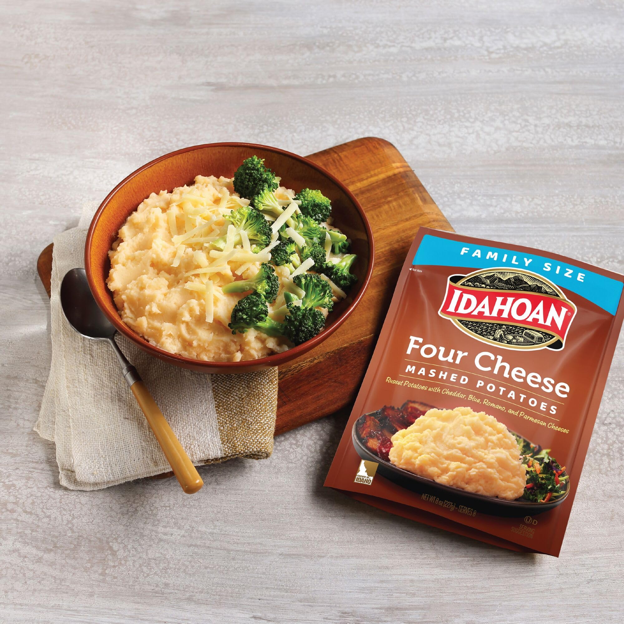 Idahoan mashed potatoes on family table demonstrating quick meal benefit