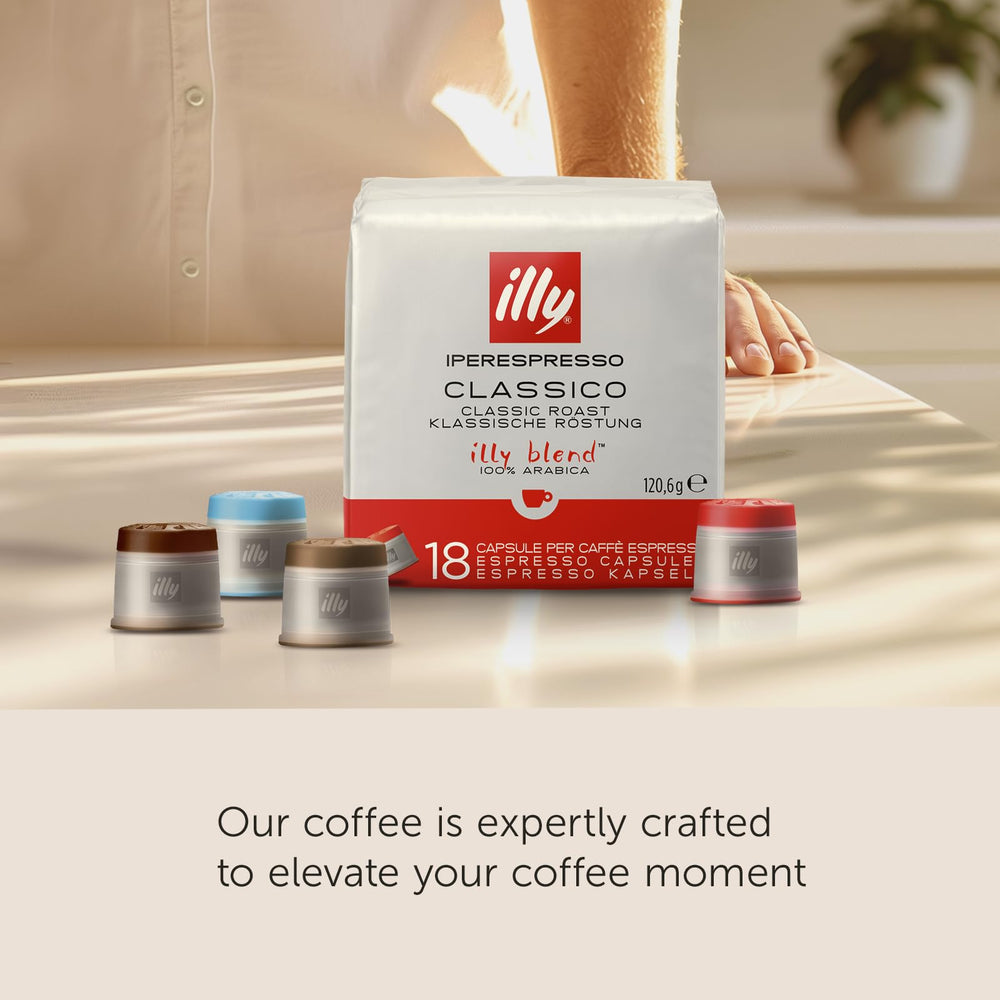 illy capsule inserted in iperEspresso machine illustrating simple single-serve brewing