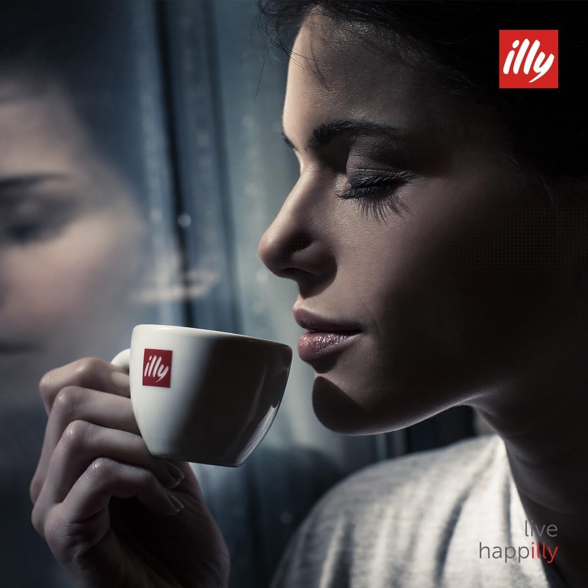 kitchen counter scene with illy Classico can and cup, evokes everyday ritual