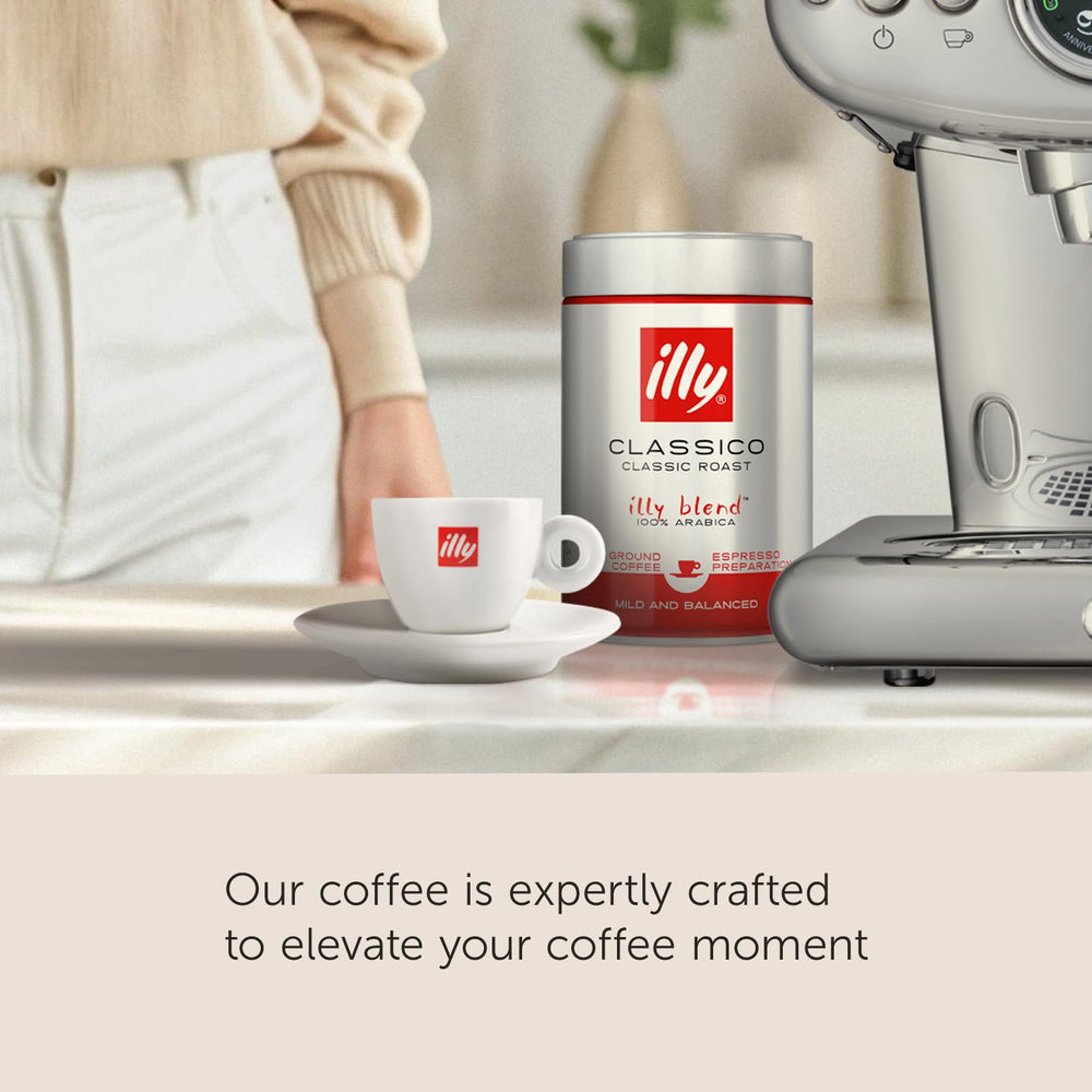 illy measuring scoop with grounds for precise dosing and consistent shots