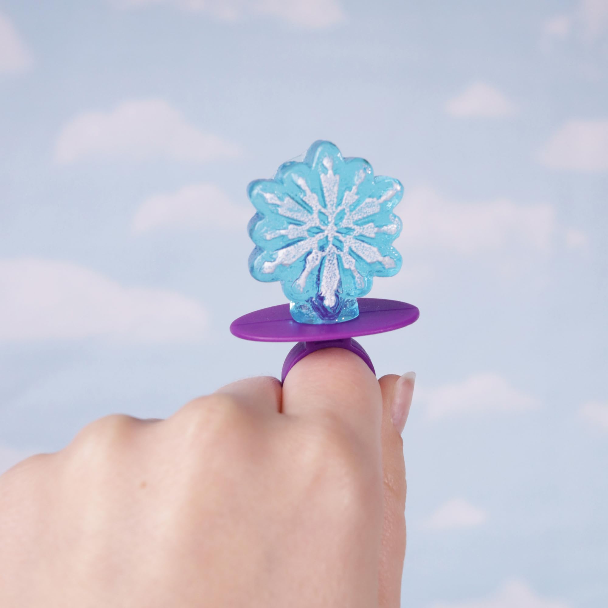 Imaginings 3 lollipop ring held in hand showing scale and wearable candy fun
