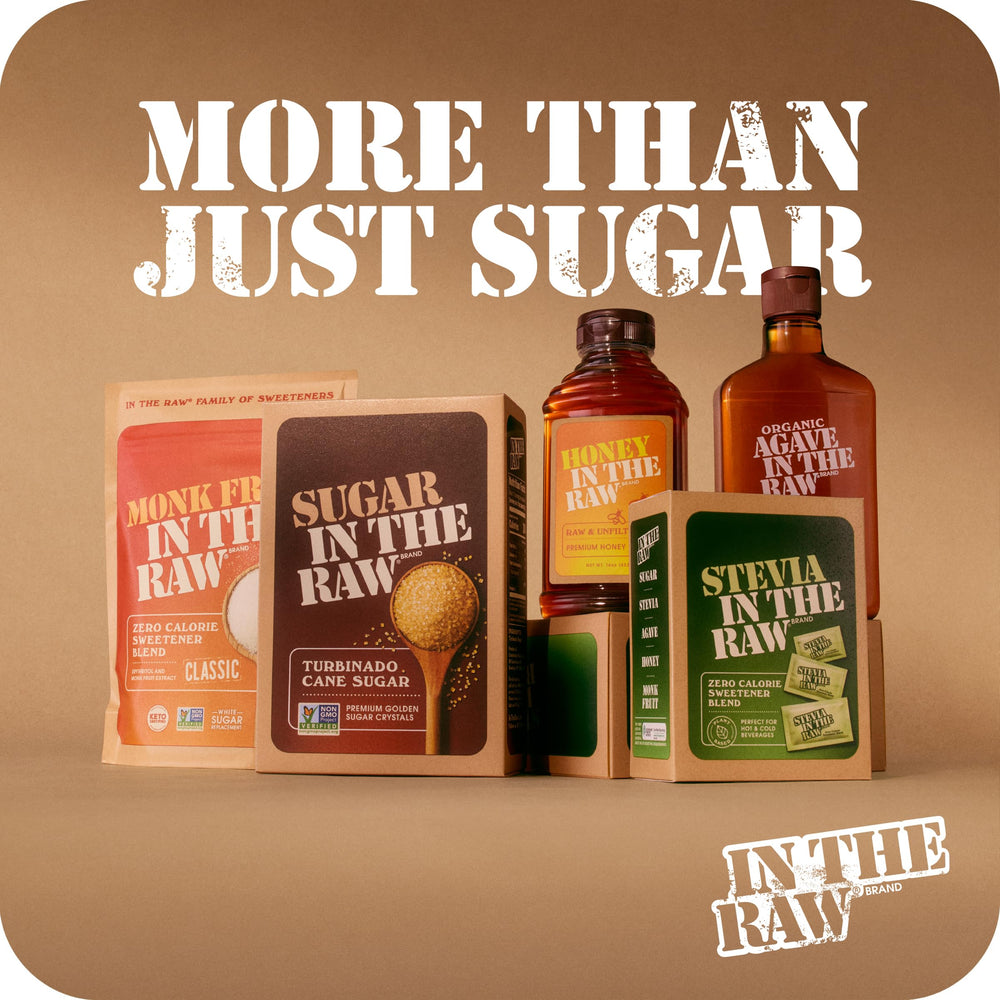 IN THE RAW bottle held by hand to show 194 oz bulk size and scale