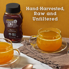 IN THE RAW spoon showing honey texture and pollen for rich, natural mouthfeel