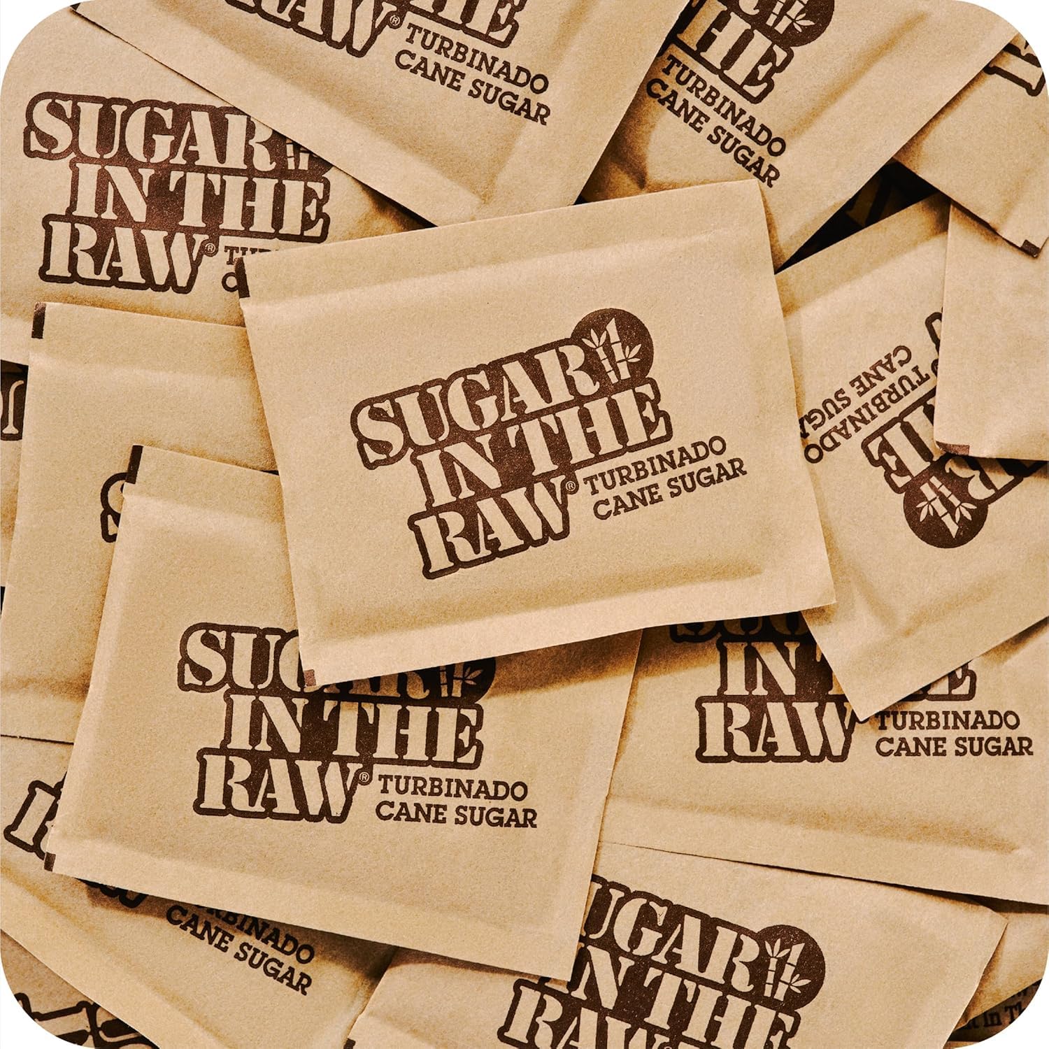 IN THE RAW opened packets with golden crystals, convenient single-serve portioning