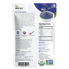 Incas open pouch revealing vibrant butterfly pea powder for easy scooping