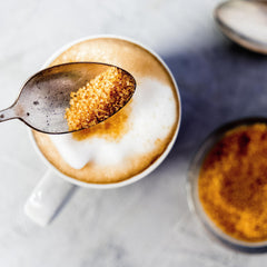 India Tree sugar crystals dissolving in a cup, adding nuanced sweetness