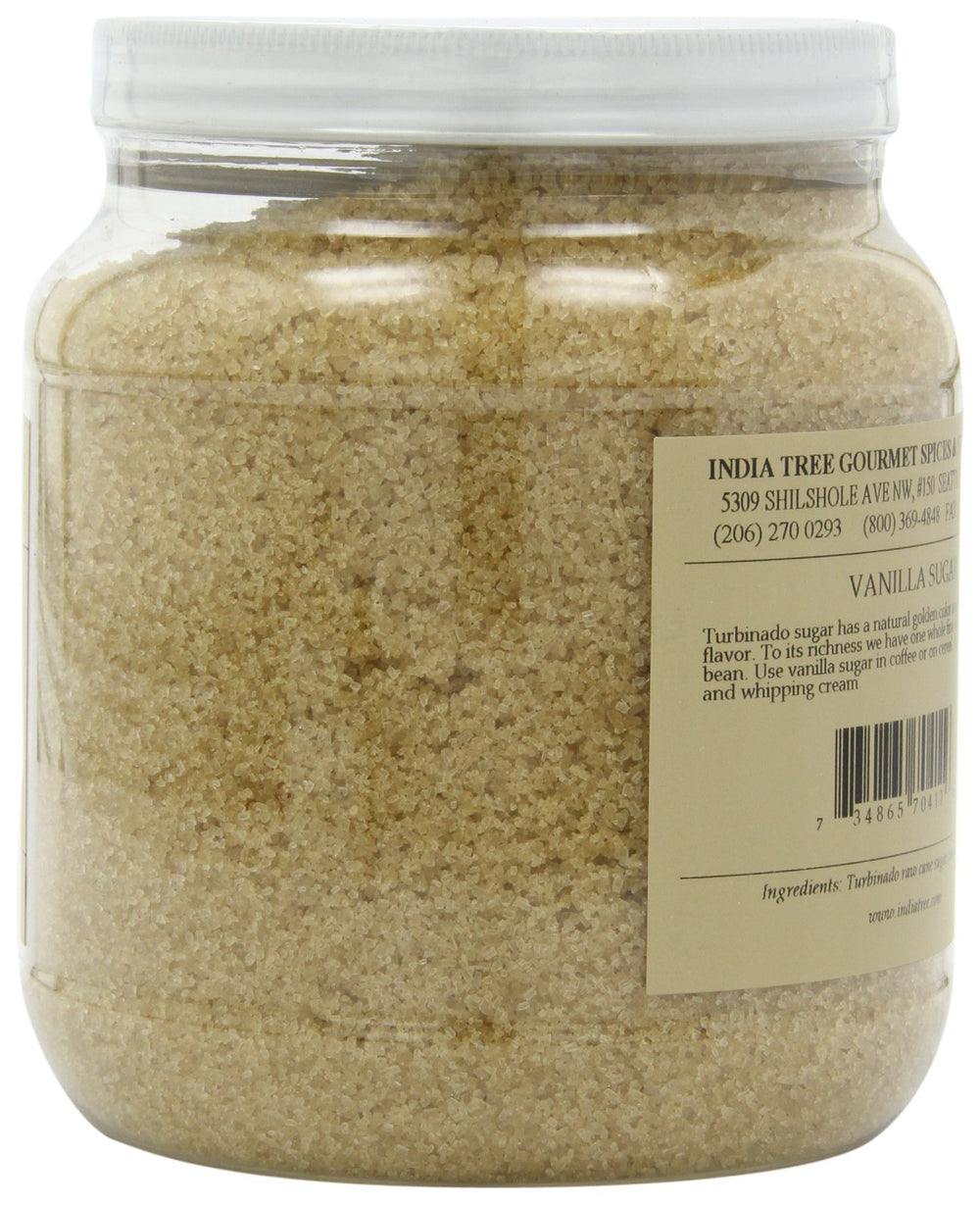 India Tree spoon stirring vanilla sugar into coffee, delivers aromatic flavor boost