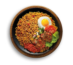 Indomie noodle cake close-up revealing texture for quick boiling and bite