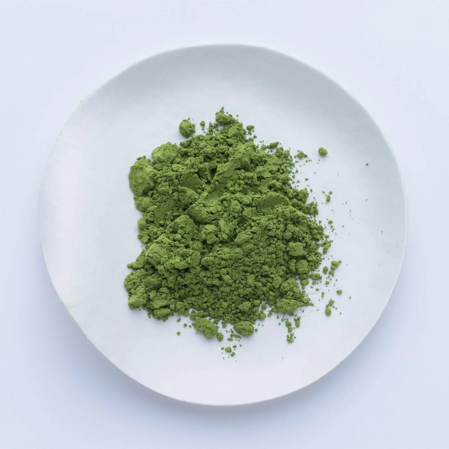 IPPODO TEA CO. Hatsu Matcha latte pour into cup, creating frothy foam and smooth taste