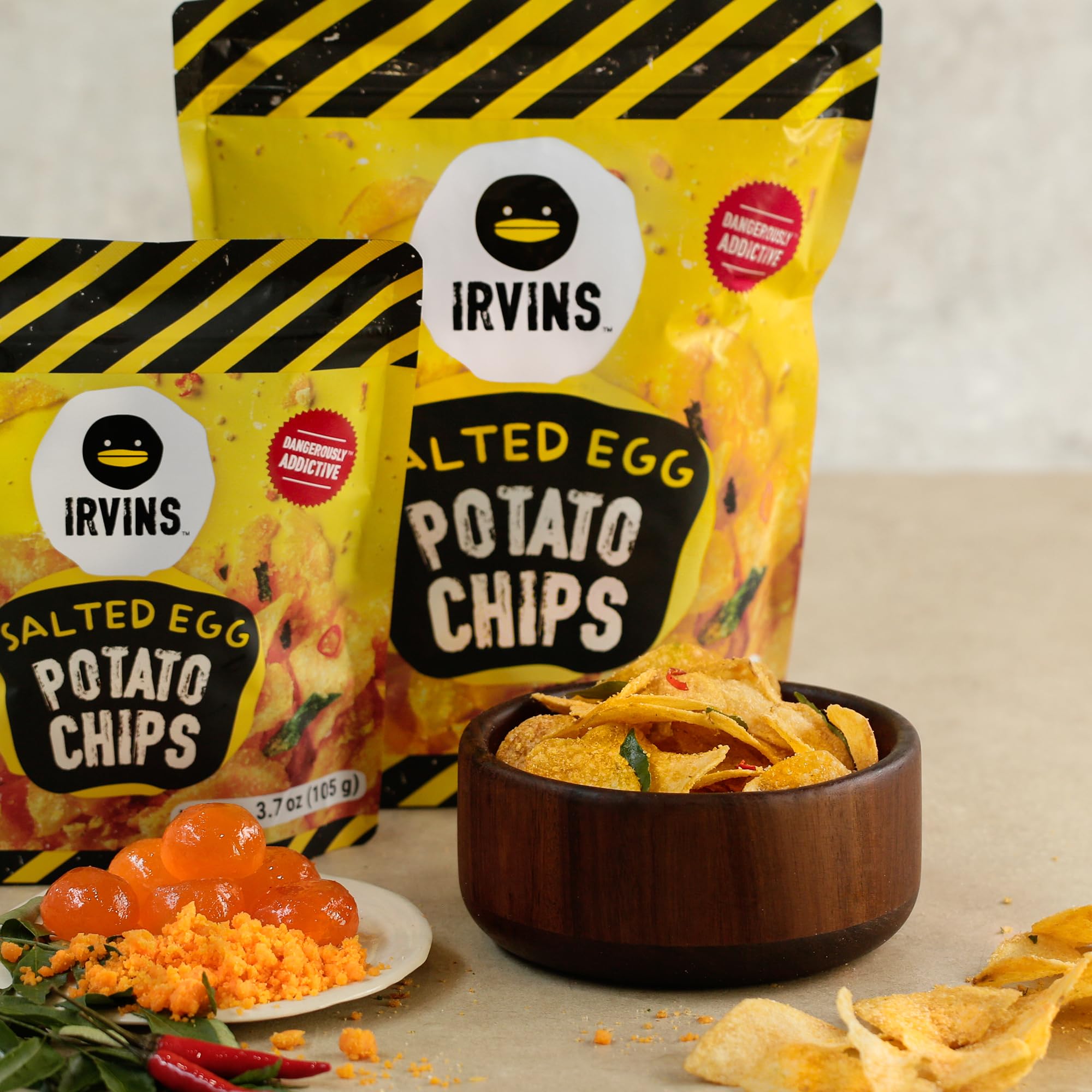 Irvin's chips held in hand for size comparison and portable convenience