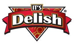It's Delish raw almonds close-up texture highlighting freshness and crunch
