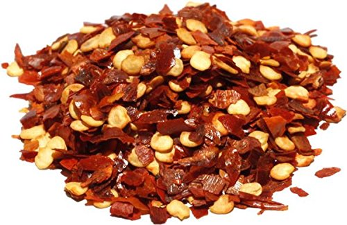 It's Delish close-up of crushed red pepper flakes texture, highlighting bold flavor