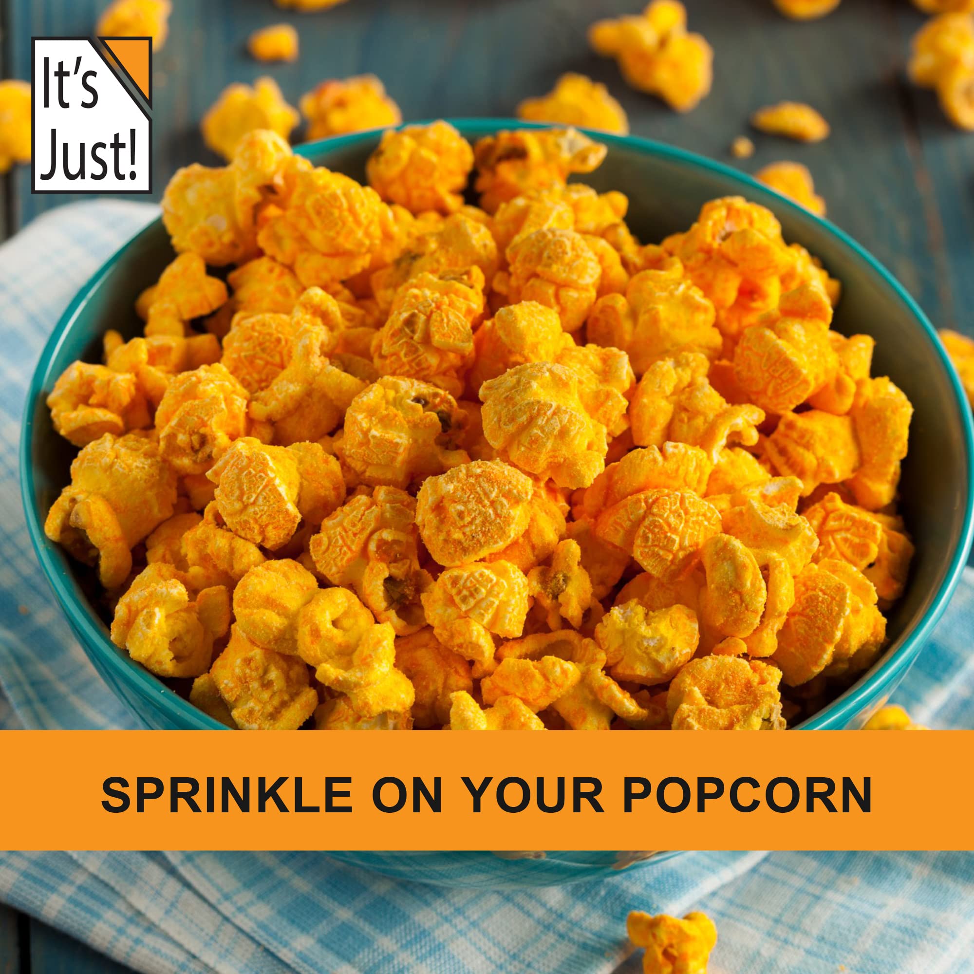 It's Just! sprinkled on popcorn to show savory topping and easy snack enhancement
