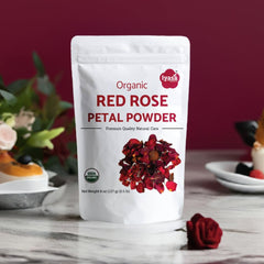 Cup of floral tea brewed with Iyasa Holistics rose powder demonstrating calming aroma