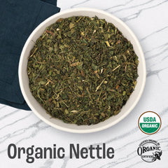 J MAC BOTANICALS open bag spilling dried nettle leaves showing generous bulk quantity