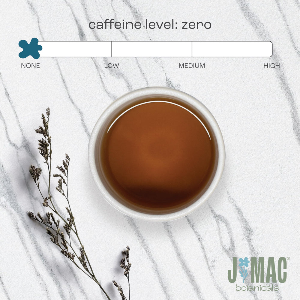 J Mac Botanicals measuring on a kitchen scale with spoon showing accurate recipe portioning