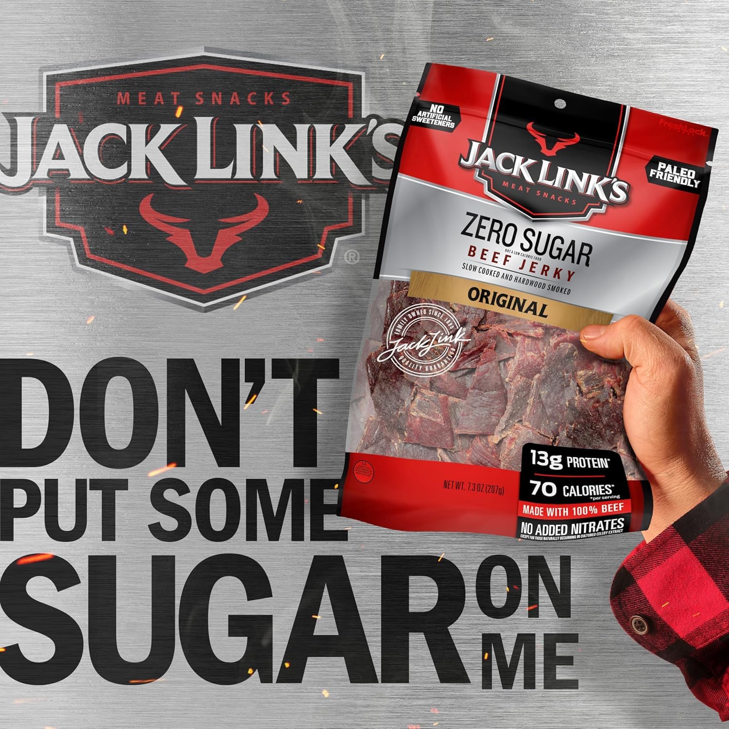 Hand holding Jack Link's bag to show real-world size and portable benefit