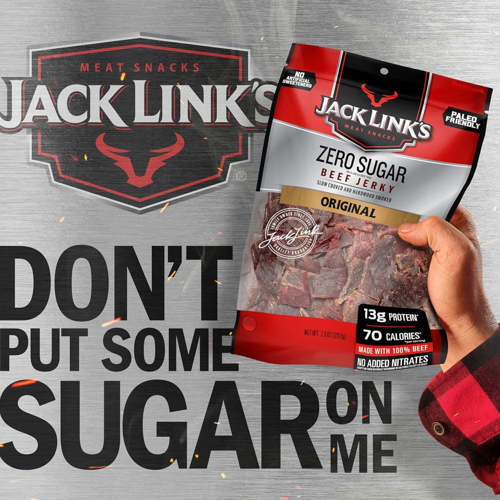 Hand holding Jack Link's bag to show real-world size and portable benefit