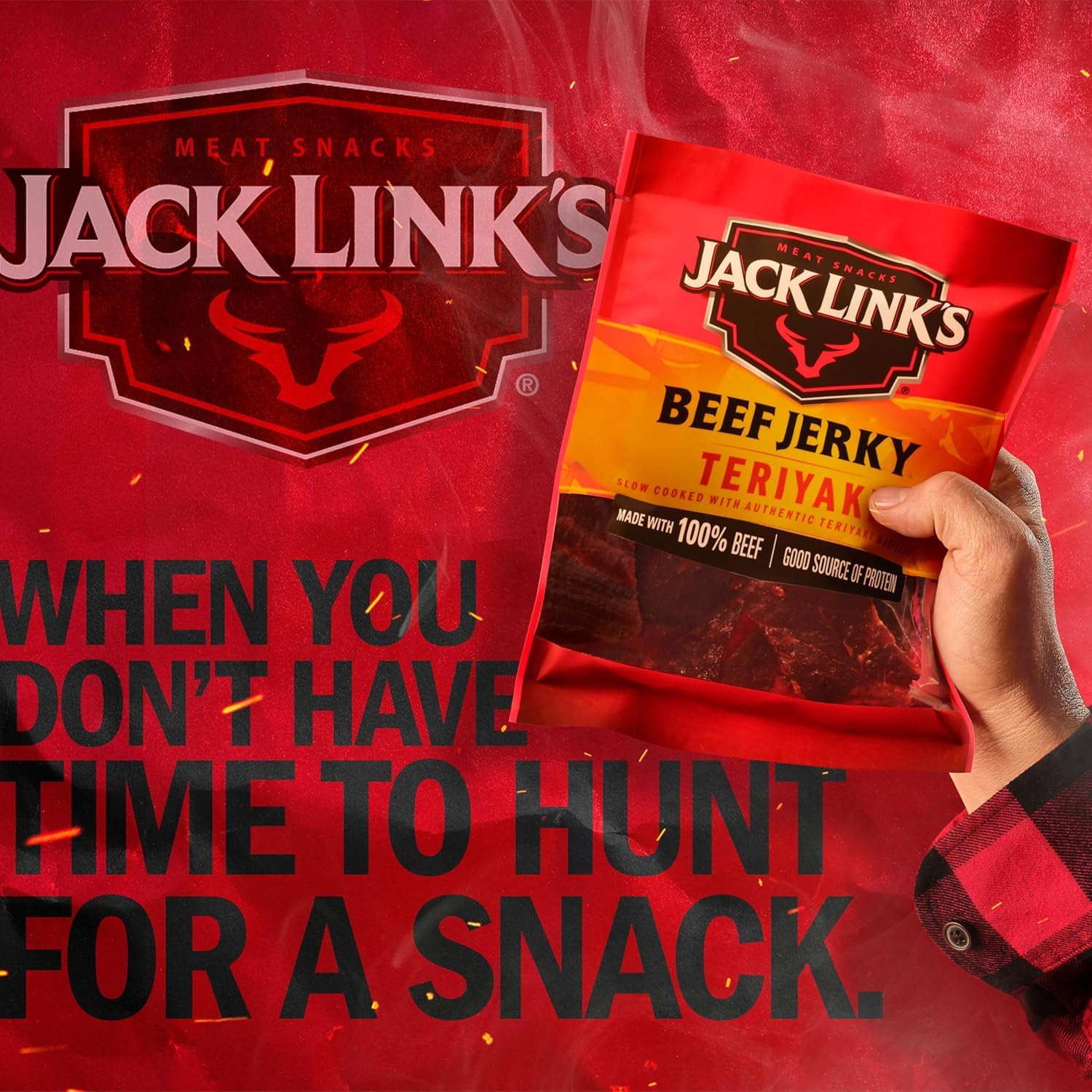 Hand holding Jack Link's half pound bag showing scale and portion size